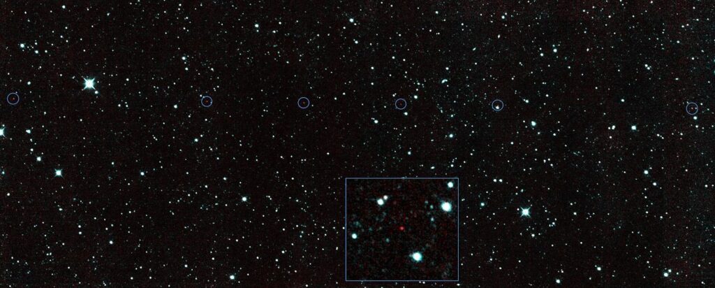 dark rocky asteroid floating against a background of stars