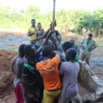 workers upgrading underground water pipes