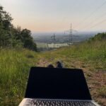 A person working remotely from home on a laptop